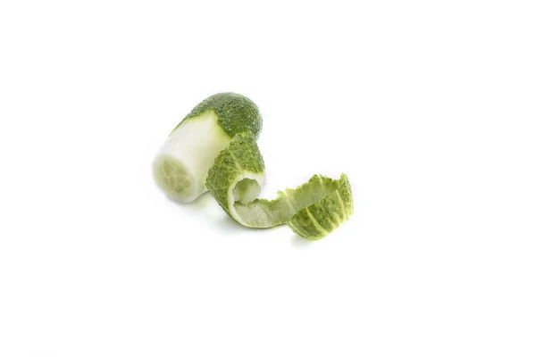 Fresh cucumber and curls of peel isolated on white background — Stock Photo, Image