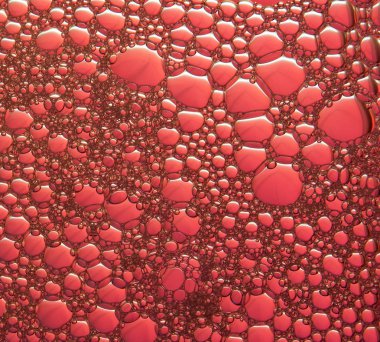 Arka plan veya doku olarak büyük kırmızı kabarcıklar