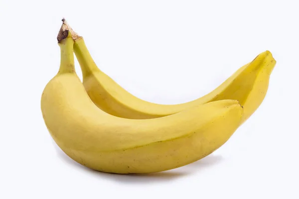 Два банана на белом фоне — стоковое фото