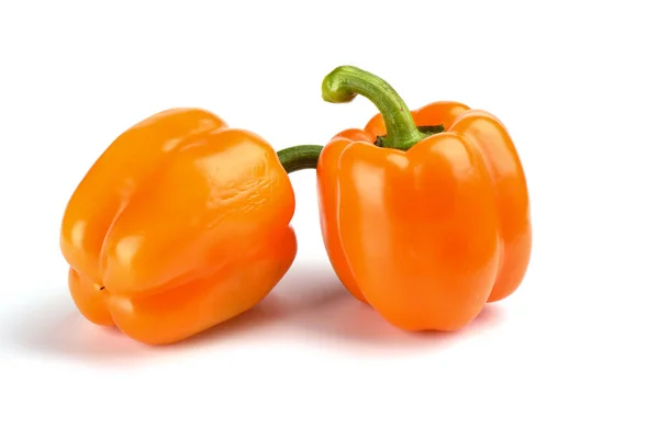 Two orange bell peppers isolated on white background — Stock Photo, Image
