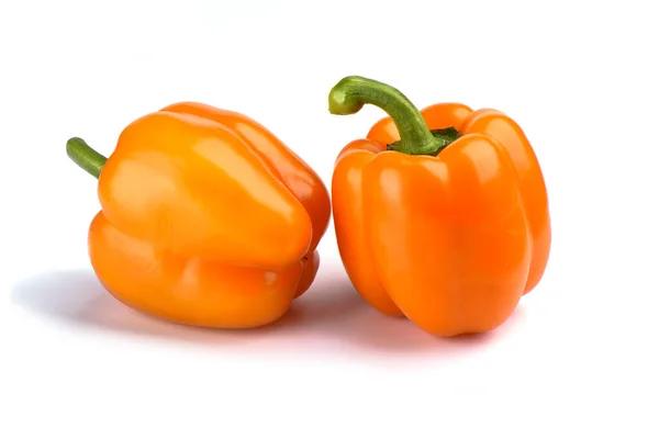 Two orange bell peppers isolated on white background — Stock Photo, Image