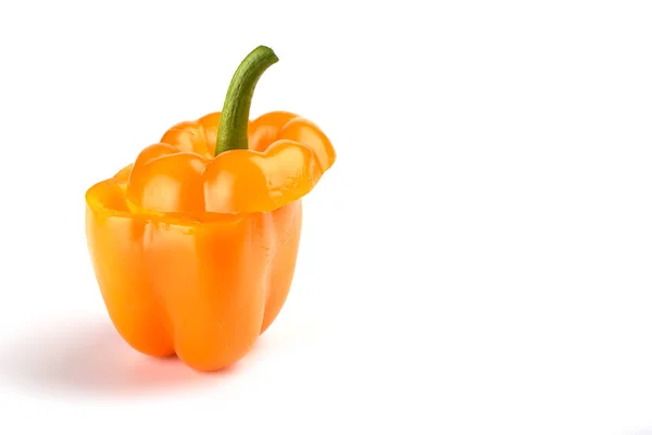 Orange bell pepper cut half on white background. — Stock Photo, Image