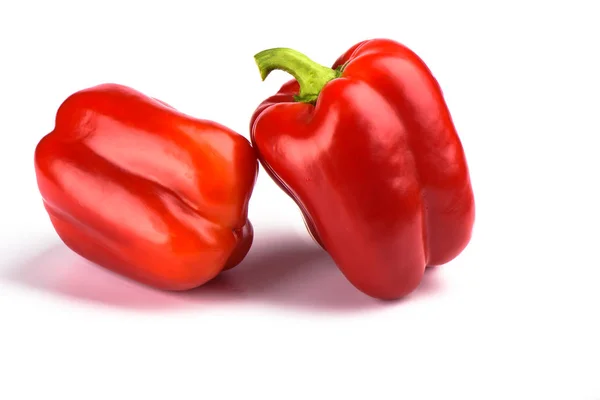 Two red bell peppers isolated on white background. — Stock Photo, Image