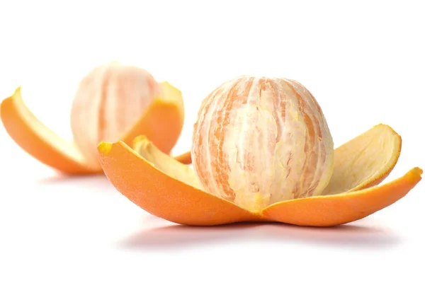 Soft focus. Two peeled orange isolated on white background. Oran — Stock Photo, Image
