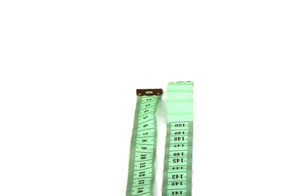 Tailoring centimeter tape geïsoleerd op een witte achtergrond. — Stockfoto