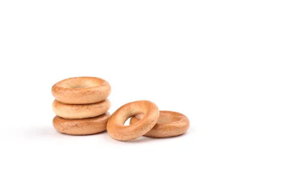 Several crispy bagels isolated on white background. — Stock Photo, Image