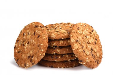 Beyaz arka planda izole tahıllar ile yulaf ezmesi çerezleri. Tatlı