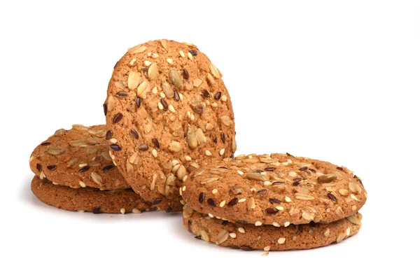 Beyaz arka planda izole tahıllar ile yulaf ezmesi çerezleri. Tatlı