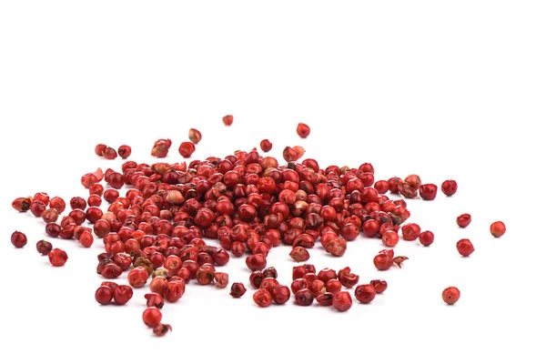 Rote Paprika-Erbsen isoliert auf weißem Hintergrund. — Stockfoto