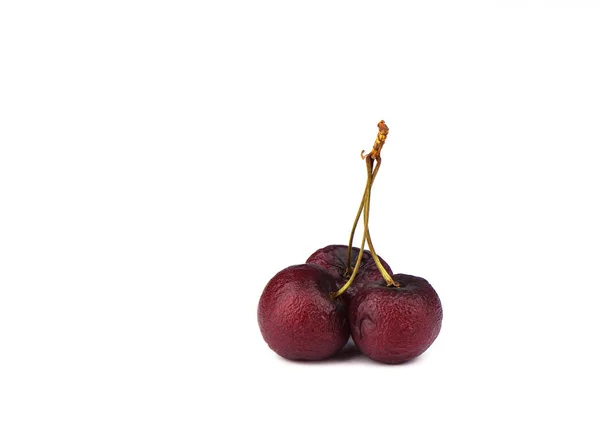Withered cherry berries on a white background — Stock Photo, Image