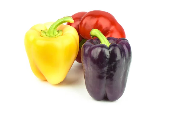 Three fresh sweet peppers isolated on white background. — Stock Photo, Image