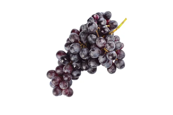 Ramo maduro de uvas pasas aisladas sobre un fondo blanco . — Foto de Stock