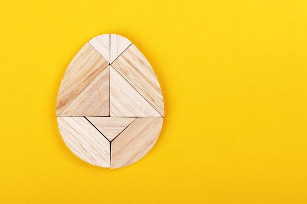 Eivormige tangram puzzel gebouwd uit tangram stukken. — Stockfoto