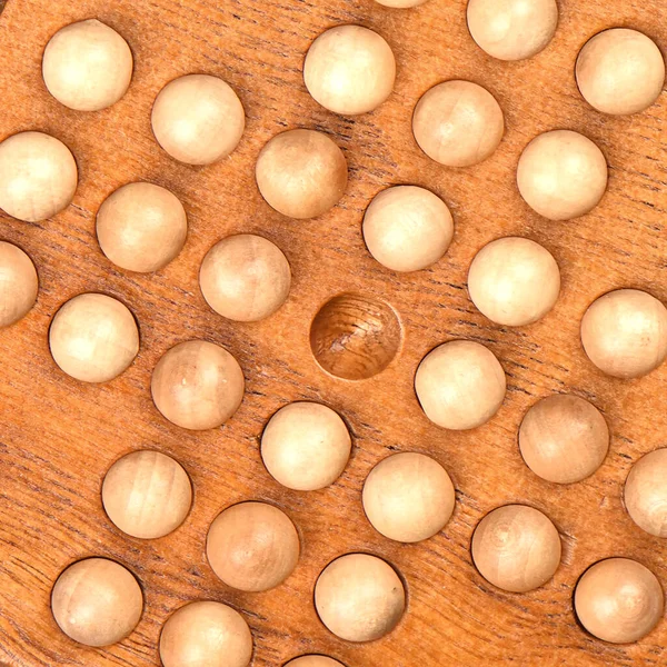 Macro heeft geschoten. Bordspel Madagaskar checkers als achtergrond. — Stockfoto