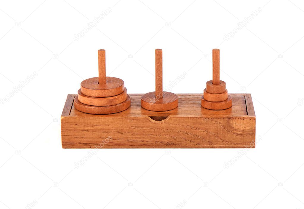 Wooden puzzle tower of hanoi over white background.