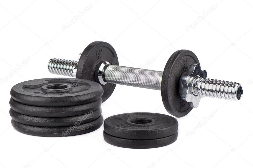 Dumbbell discs and dumbbell isolated on white background.