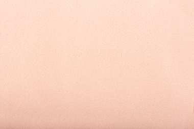 Arkaplan veya doku olarak pembe ipliksiz kumaş.