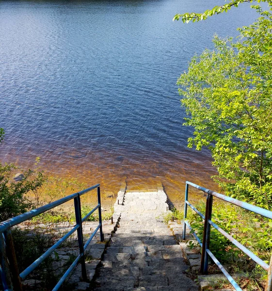 Flooded stairs on the lake flood clean water