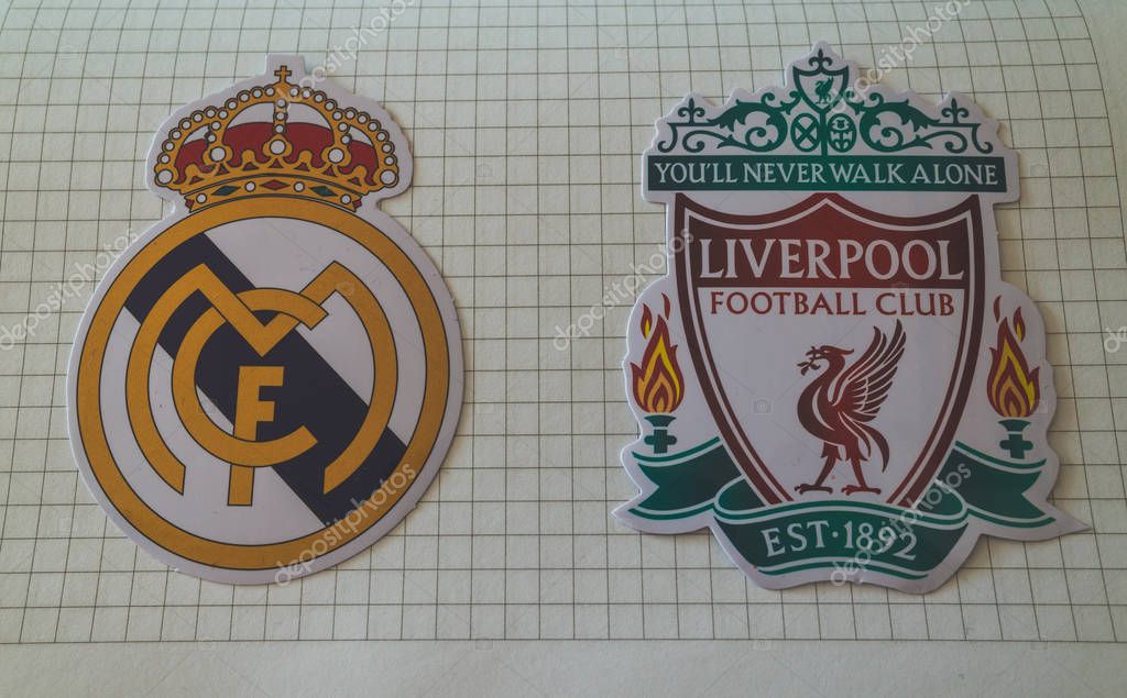 May 22, 2018 Ukraine, Kiev. Emblems of the finalists of the UEFA Champions League season 2017/2018 Spanish Real Madrid and English Liverpool.