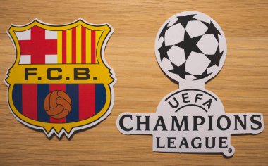 15 Aralık 2018. Nyon İsviçre. Futbol club Barcelona ve Uefa Şampiyonlar Ligi logosu.