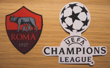 15 Aralık 2018. Nyon İsviçre. AS Roma futbol kulübü logosu ve Uefa Şampiyonlar Ligi.
