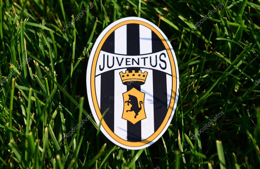 September 6, 2019 Istanbul, Turkey. The emblem of the Italian football club Juventus Turin  on the green grass of the football field.