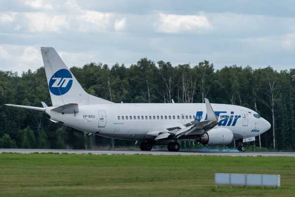 July 2, 2019, Moscow, Russia. Airplane Boeing 737-500 UTair Aviation Airlines at Vnukovo airport in Moscow.