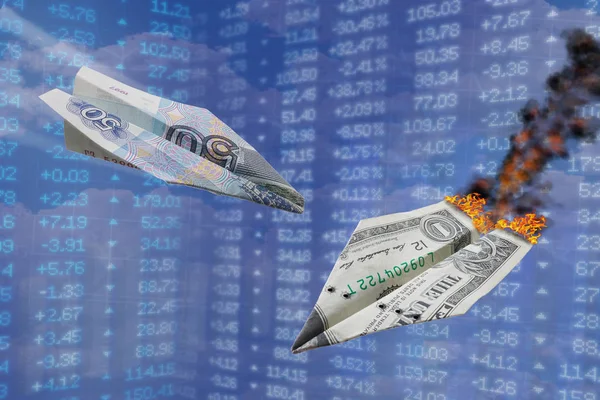 Exchange rate illustration. Strong ruble rate hits dollar like one war paper plane hits another. Ruble vs dollar. Russian rouble grows up. Paper planes air fight. World money currency devaluation. Rouble vs dollar rate