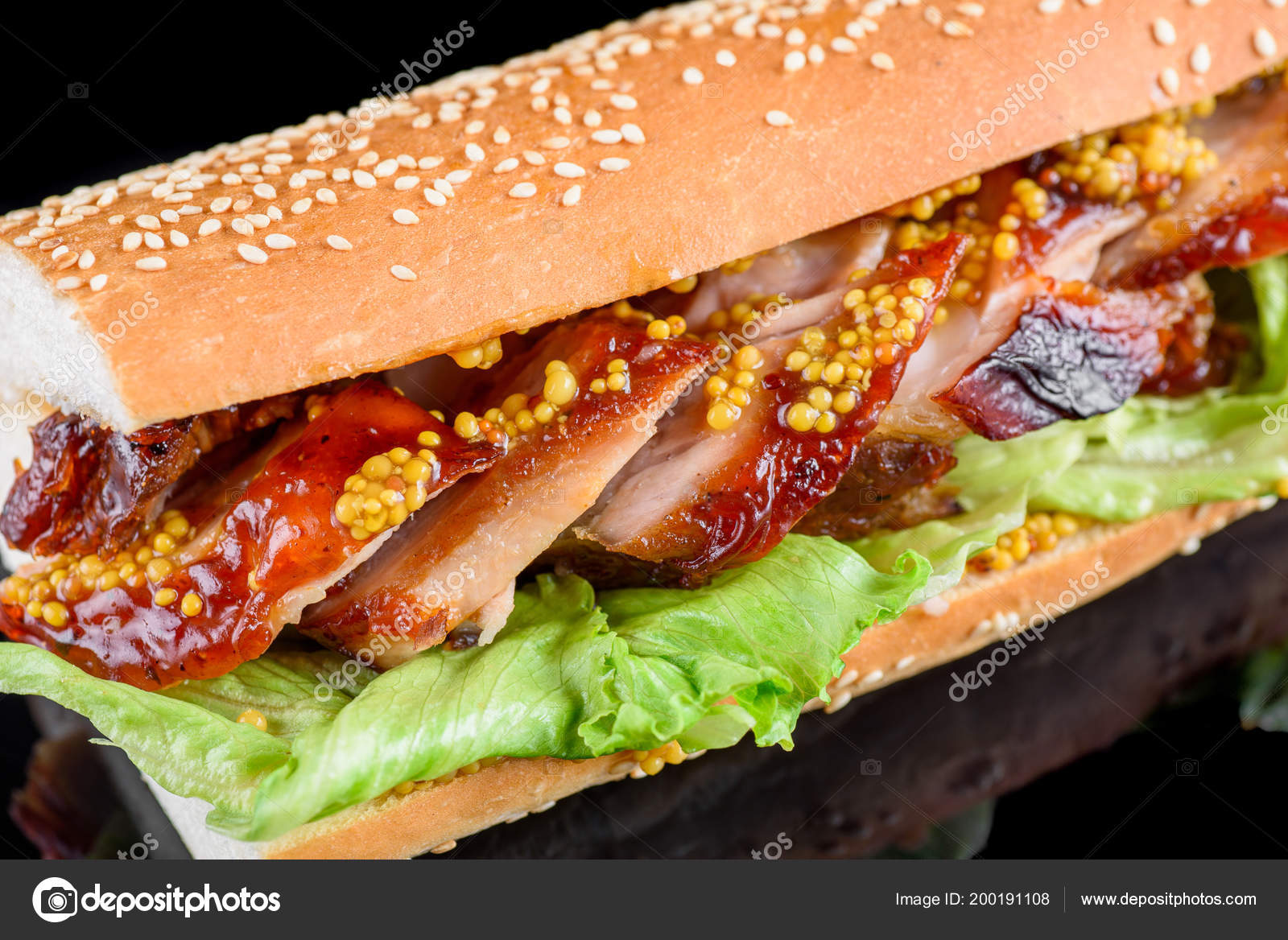 Giant BBQ Rib Sandwich with salad leaf and French mustard in