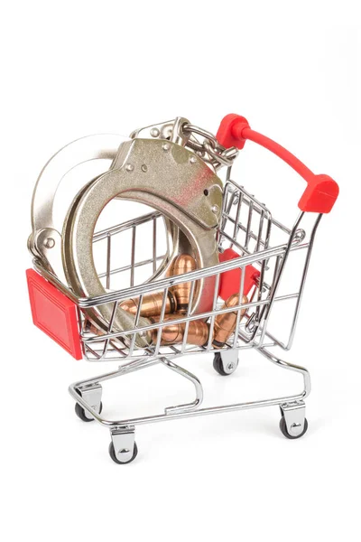 Shopping Cart Handcuffs Ammunitionover White — Stock Photo, Image