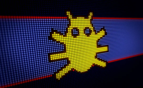 Computer virus symbol on big LED display with large pixels. Bright light danger icon on lamps stylized screen.