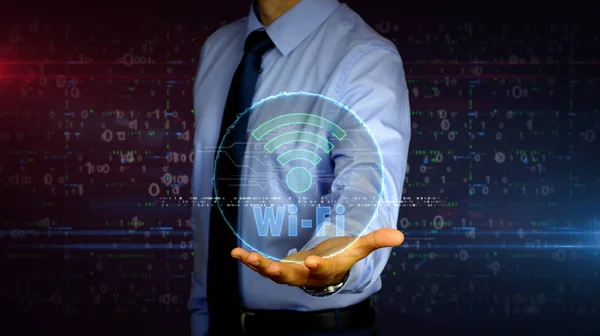 Affärsman med Wi-Fi-hologram — Stockfoto