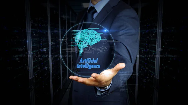 Homem de negócios e tela com holograma símbolo do cérebro cibernético — Fotografia de Stock