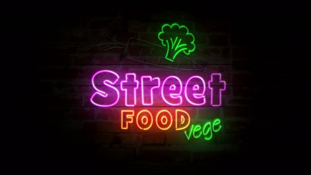 砖墙上的街头美食霓虹灯符号 带有素食和绿叶标志的灯泡 可循环和无缝的动画 — 图库视频影像
