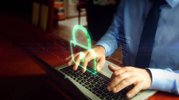 Hombre Escribiendo Ordenador Portátil Con Pantalla Holograma Candado Sobre Teclado —  Fotos de Stock