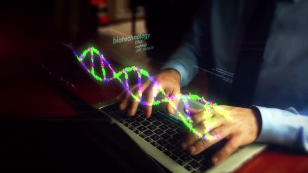 男子在笔记本电脑上打字 用生物技术和Dna螺旋全息图屏幕在键盘上 生物信息学 生物学 化学和研究概念 手相机摇动 — 图库视频影像