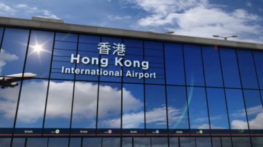 Jet uçağı Hong Kong, Çin 3d render animasyon iniş. Cam havaalanı terminali ve uçağın yansıması ile şehre varış. Seyahat, iş, turizm ve ulaşım konsepti.