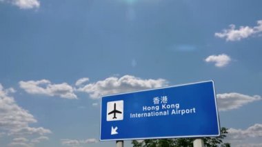 Jet uçağı Hong Kong, Çin'e iniş. Havaalanı yön işareti ile şehir varış. Seyahat, iş, turizm ve ulaşım konsepti. 3d render animasyonu.