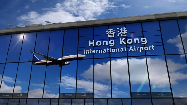 Avião aterrissando em Hong Kong espelhado no terminal — Fotografia de Stock