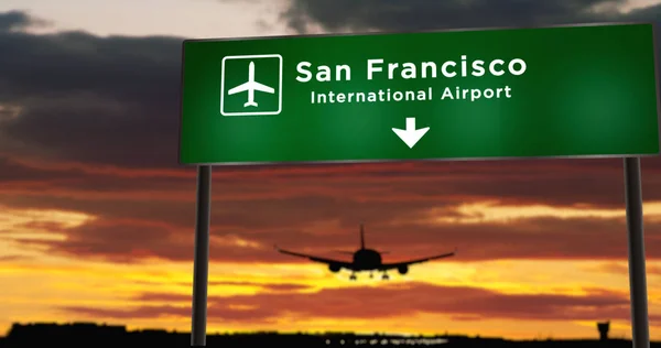 Avión aterrizando en San Francisco, California con letrero — Foto de Stock