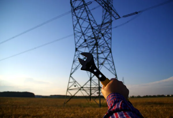 Industry Power Line Maintenance Concept Wrench Hand Silhouette Electric Pylon — Stock Photo, Image