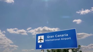 Jet uçağı Gran Canaria, Canary, İspanya 'ya iniyor. Havaalanı istikameti işaretli şehir gelişi. Seyahat, iş, turizm ve ulaşım konsepti. 3B canlandırma canlandırması.