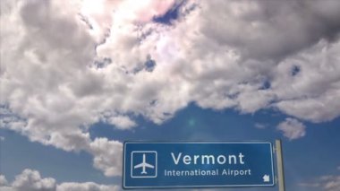 Vermont ABD Jet uçağı iniyor. Havaalanı istikameti işaretli şehir gelişi. Seyahat, iş, turizm ve uçak taşımacılığı kavramı.
