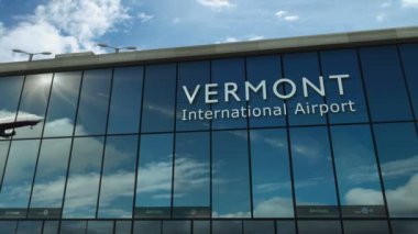 Vermont, USA 3D 'ye uçak iniyor. Cam havaalanı terminali ve jet uçağının yansımasıyla şehre vardık. Seyahat, iş, turizm ve ulaşım 3D konsepti.
