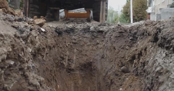 Excavator man POV, Backhoe working for house or streer construction. Street work. Excavator is digging the ground — Stock Video