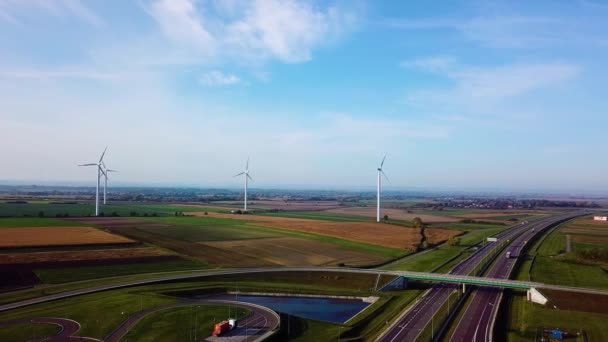 Aerial Drone view. Wind turbines and agricultural fields on a summer day. Ver 1 — Stock Video