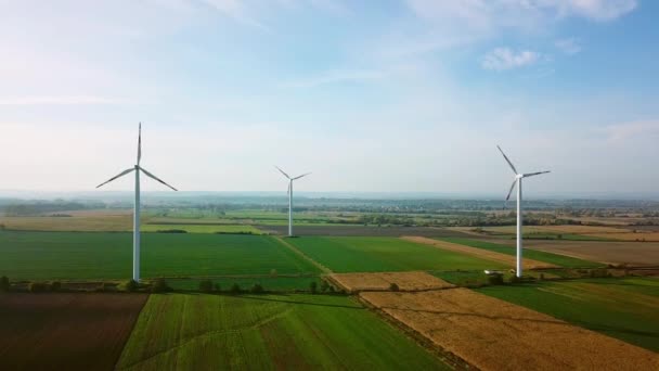 Aerial Drone view. Wind turbines and agricultural fields on a summer day. Ver 4 — Stockvideo
