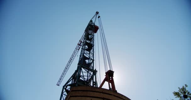 Crane rotate at building construction site, architecture apartments. Wide shot V3 — Stock Video