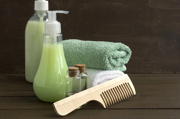 Liquid Soap Two Towels Wooden Background — Stock Photo, Image