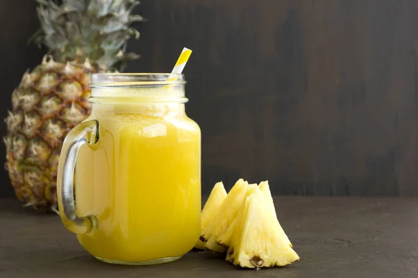 Pineapple juice in a jar with a straw. — Stock Photo, Image